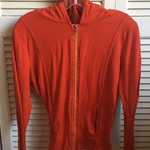 Thin, orangey-red jacket w/hoodie